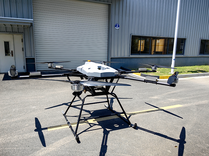 AgriStorm Titan H-600 hybrid drone flying over U.S. farmland